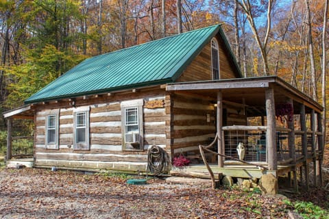Welcomed to a beautiful, rustic 1800s log cabin with a wrap around porch. 