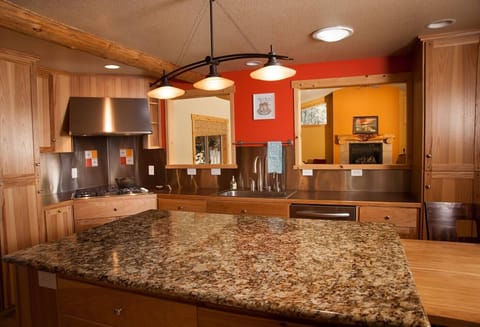 Kitchen looks into the huge living room