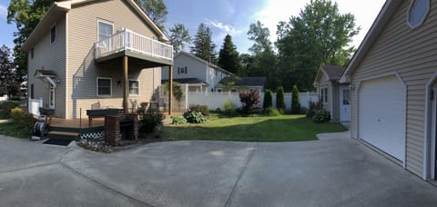 large rear deck and green space for games