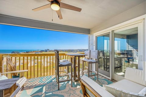 Sip your morning coffee on this stunning covered balcony while gazing at endless ocean views and coastal scenery stretching to the horizon.