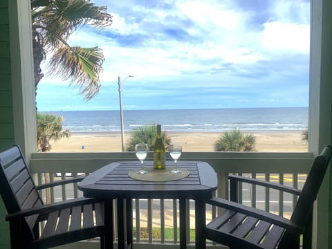 Watch the dolphins or sunset from your private balcony