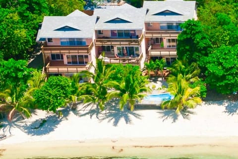 Bayside Villas next door to Las Rocas.  The Best location on West Bay Beach!!