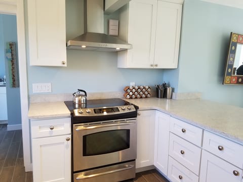new tile floor, cabinets and countertops