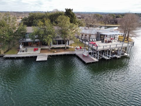 Swim platform, stairs into water, boat slip and 2 jet ski docks for guest use.
