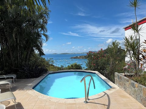 Your view from the pool overlooks Great Cruz Bay and the islands of St John and St Thomas