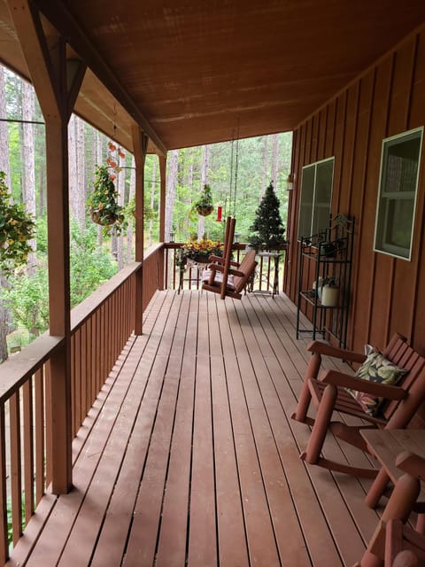 Back covered porch with swing