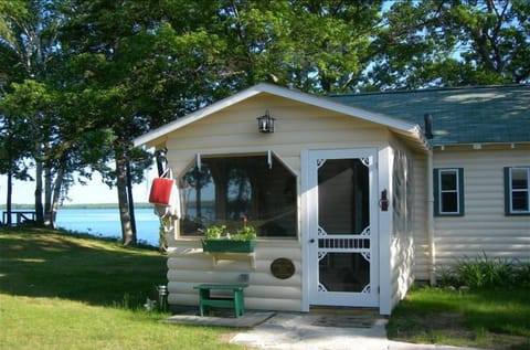 Screened porch with pull down shades for privacy