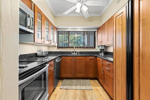 Kitchen with granite counter tops.