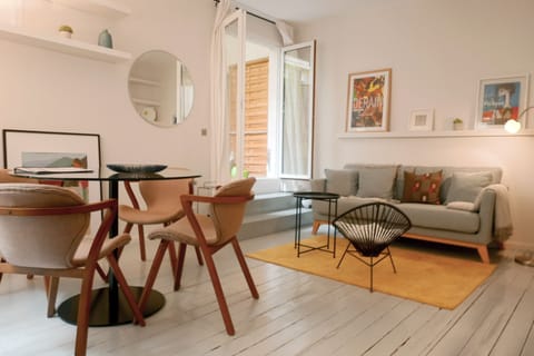 The living / dining area is warmly decorated