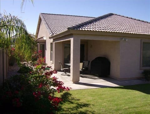 Nice Backyard with Bar-b-q and outdoor furniture.