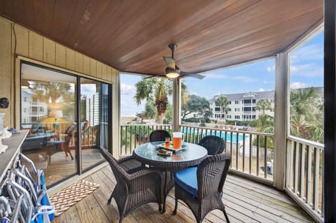 Screened porch overlooking the ocean and pool!