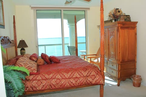 The master bedroom with a King size bed and an amazing waterview
