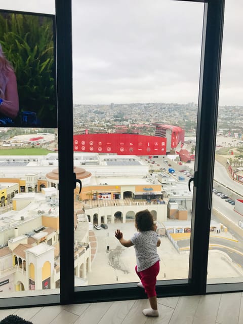 Living room w View of the Xolos/Caliente Stadium, Casino, racetrack, mall & city