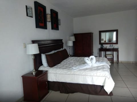 Romantic Room, 1 King Bed, Non Smoking, Pool View | Iron/ironing board, free WiFi, bed sheets