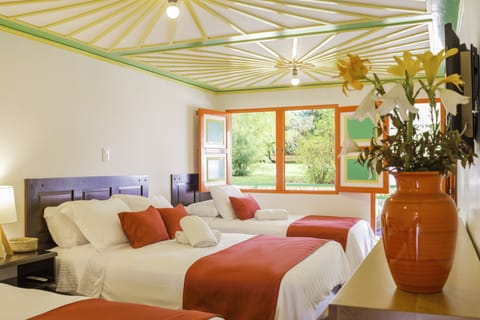 Family Room, Multiple Beds | Blackout drapes, iron/ironing board, free WiFi, bed sheets