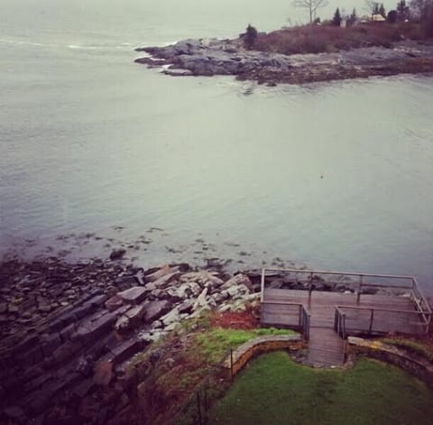 View of the shorefront deck from the second floor master bedroom