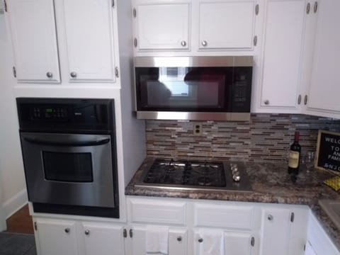 Kitchen includes a nice gas cook top, built in oven and programmable microwave.