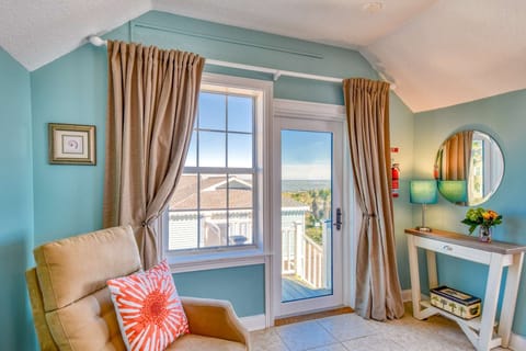 Step out onto the balcony to breathe in the fresh, ocean breeze