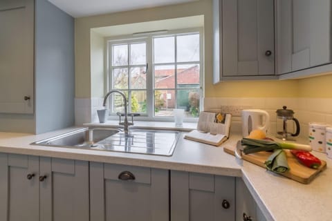 Ground floor: Kitchen with views out into the garden