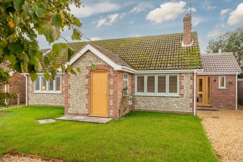 The Hares, Brancaster: A wonderfully spacious detached bungalow with a lovely south facing garden