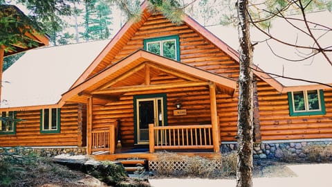 Beautiful 4,200 square foot custom log cabin on a secluded 3 acre lakefront lot.