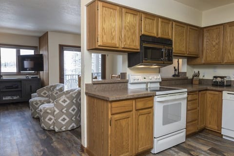 Kitchen into living room.