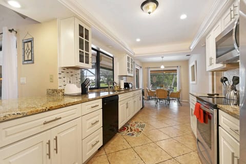 The kitchen is fully-equipped & has stainless steel appliances