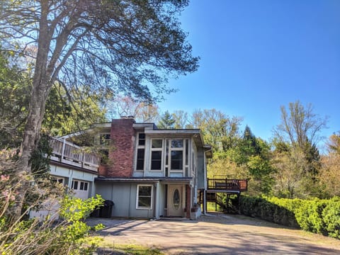 Unique, serene house nested at the back of a beautiful 4-acre property.