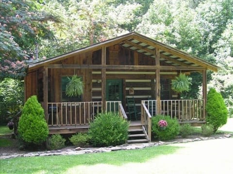 Appalachian style log cabin in a quiet setting.