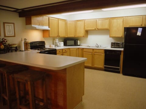 Big well stocked kitchen.