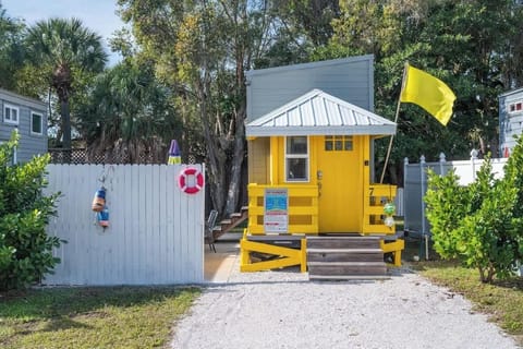 Front of Tiny House Yellow Lifeguard Stand