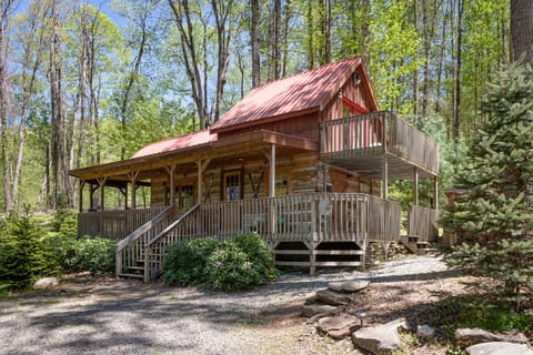 Large wrap around covered porch and private  upper deck off bedroom.