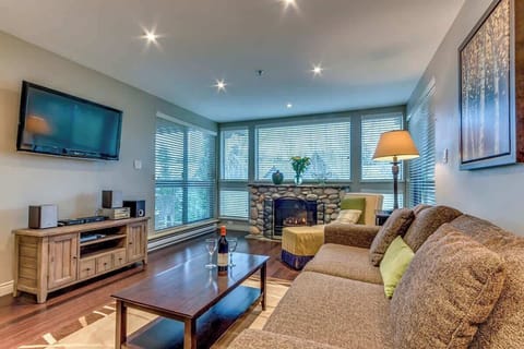 Living Room - Fireplace and Large TV - Greystone Lodge Unit 216