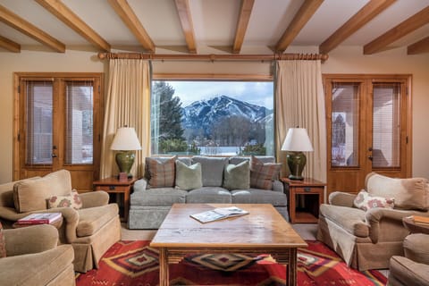 Sink into plush seating while admiring spectacular mountain views through your picture window.