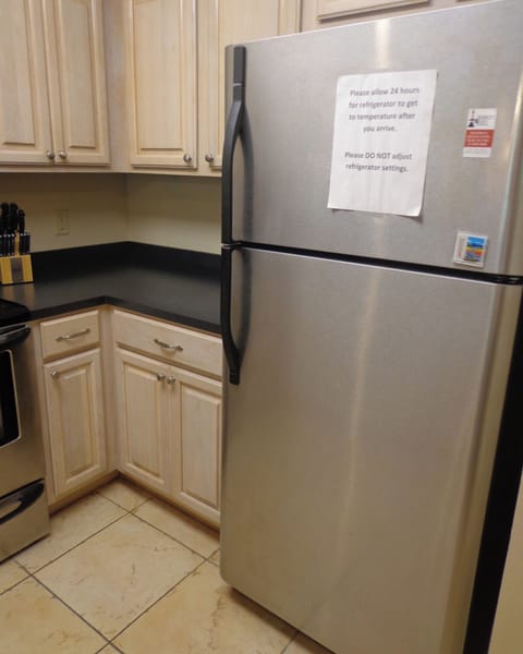 Full kitchen with coffee maker.