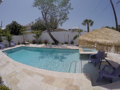 great backyard pool and travertine patio