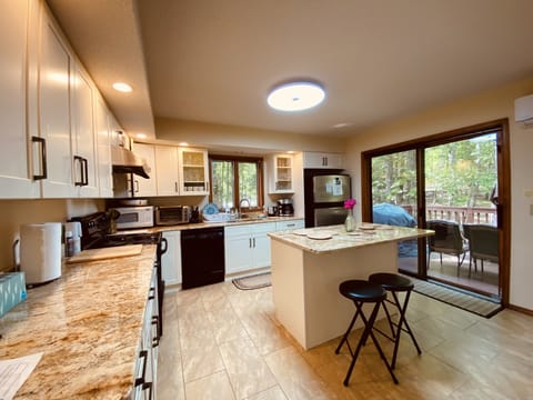 Kitchen area leading to deck. 