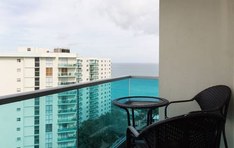 Enjoy ocean views while lounging on the balcony with a drink.