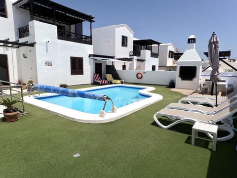Large pool and non-slip Astro turf (new 2025) terrace, BBQ and seating area