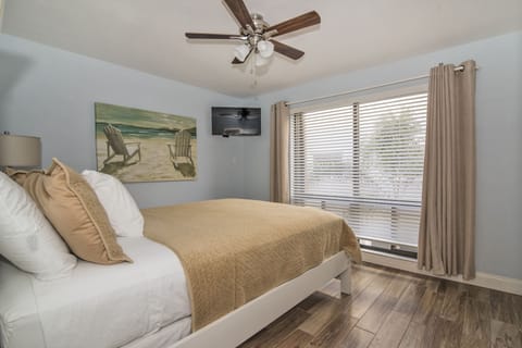 bedroom 1 with a smart TV