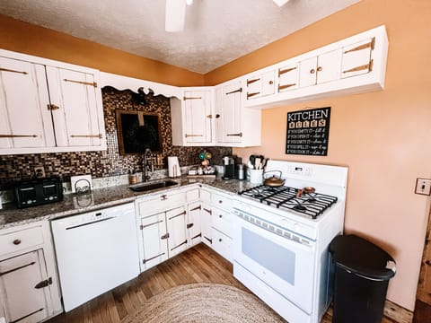 Kitchen with oven, microwave, fridge, toaster, keurig coffee maker & dishwasher