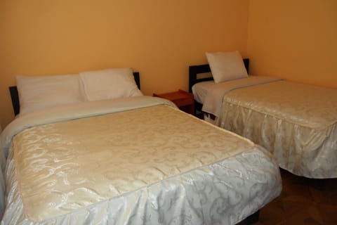 Standard Room, Multiple Beds, Non Smoking, Private Bathroom | Blackout drapes, soundproofing, free WiFi