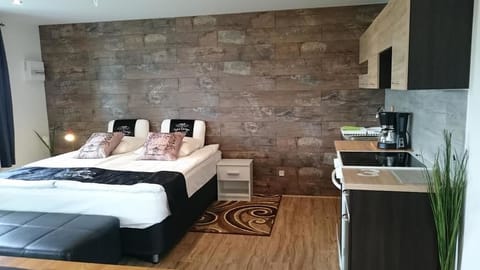 Deluxe Studio Suite, Multiple Beds, Non Smoking, Garden View | Premium bedding, desk, blackout drapes, soundproofing
