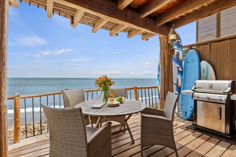 Dine al fresco while watching the surfers