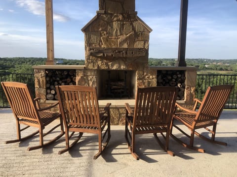 Outdoor fireplace with great hill country view! 