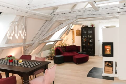 A luxurious, bright, very well furnished attic apmnt. Not too hot in the summer.