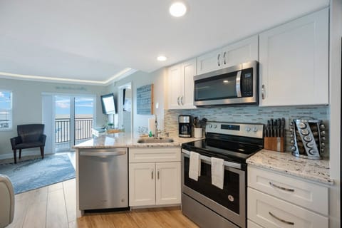 Full kitchen with all the conveniences of home! Look at that view of the Gulf! 