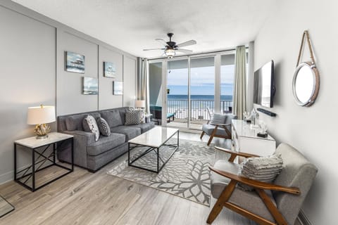 Living room, flat screen TV, balcony views