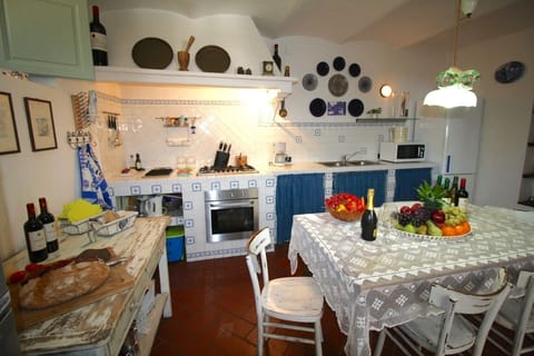 Villa (Multiple Bedrooms) | Private kitchen | Highchair