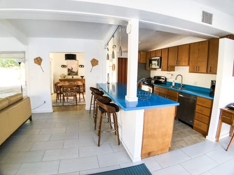 relax in one of the barstools while enjoying great conversation with the chef